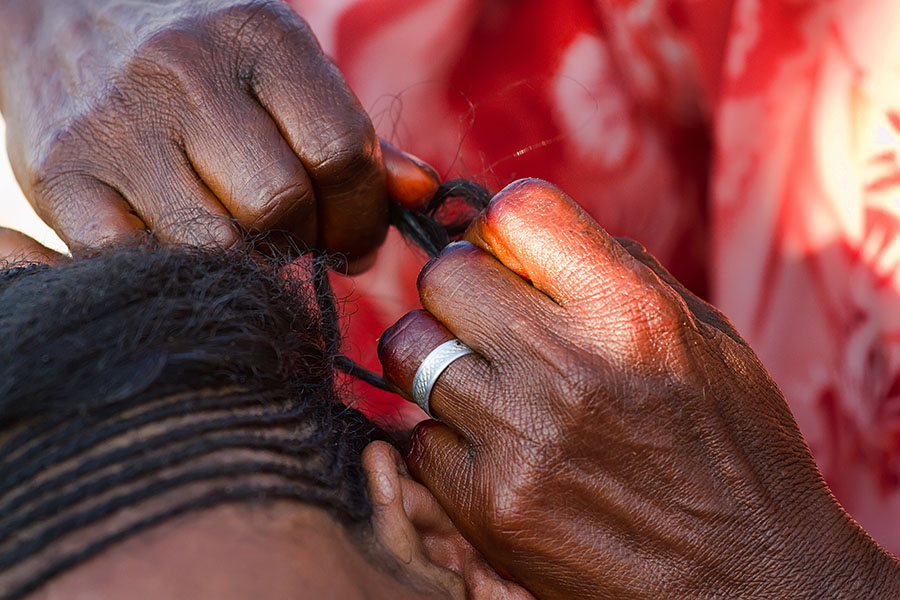 84   Hair braiding women. Ethiopia
